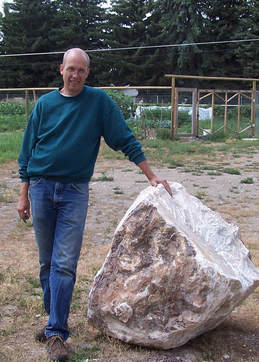Jeff next to alabaster boulder